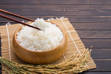 Close-up of white rice or jasmine rice in a wooden bowl