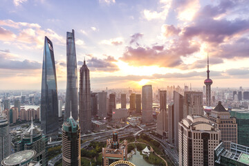 Shanghai skyline and cityscape at sunset.