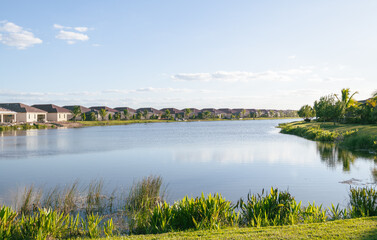 Fototapeta na wymiar Pond in luxury golf community, South Florida