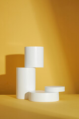 Yellow background with circle , square white podium and blank space for advertising , abstract content , front view