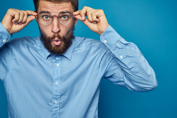 business man with glasses emotions blue background