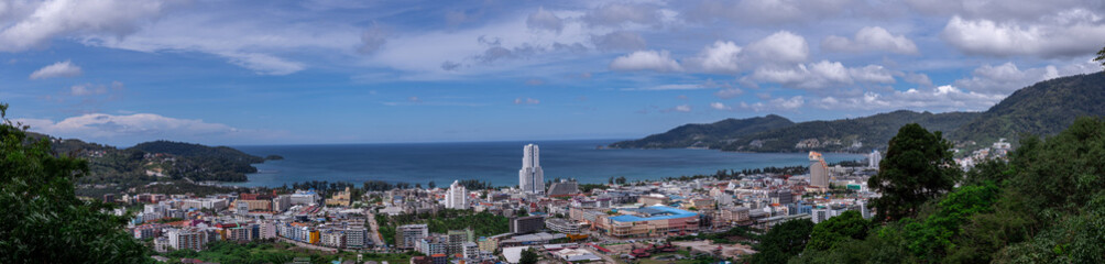 view of Patong and patong beach with the buildings and high-rise hotels and resorts in the background Kathu phuket Thailand 