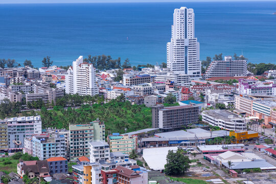 view of Patong and patong beach with the buildings and high-rise hotels and resorts in the background Kathu phuket Thailand 