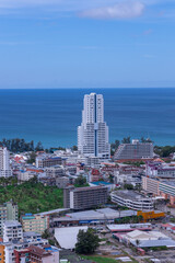 Fototapeta premium view of Patong and patong beach with the buildings and high-rise hotels and resorts in the background Kathu phuket Thailand 