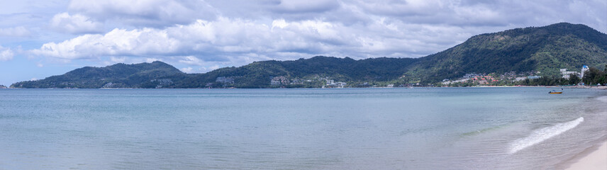 Fototapeta na wymiar view of Patong and patong beach with the buildings and high-rise hotels and resorts in the background Kathu phuket Thailand 