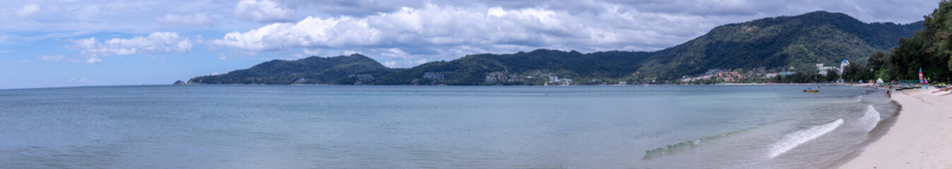 view of Patong and patong beach with the buildings and high-rise hotels and resorts in the background Kathu phuket Thailand 