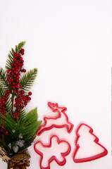 Christmass flatlay spruce branch and christmas cookie cutters