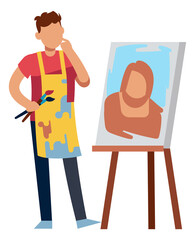 Artist drawing portrait. Man holding paintbrush and looking at canvas
