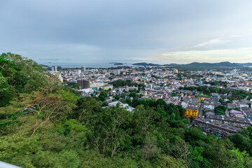 Panoramic view old phuket town viewed from Khaorang Hill and in the distance is Challong Bay and the islands big Buddha and Rawai Phuket Thailand