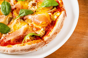 fresh pizza on the wooden background