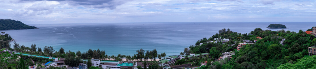 Obraz premium Kata Beach, Kata Noi beach Phuket with beautiful blues and Greens, turquoise oceans islands mountains boats trees and beautiful resort island of phuket thailand