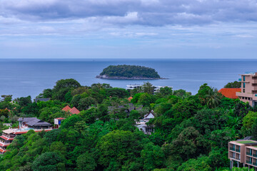 Kata Beach, Kata Noi beach Phuket  with beautiful blues and Greens, turquoise oceans islands mountains boats trees and beautiful resort island of phuket thailand