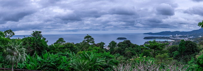 Kata Beach, Kata Noi beach Phuket  with beautiful blues and Greens, turquoise oceans islands mountains boats trees and beautiful resort island of phuket thailand