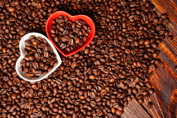 Two hearts full of coffee beans. Love symbol, greeting card for valentine's day. Good morning coffee drinker
