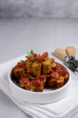 Tahu fantasi sosis or sarang burung is fried steamed tofu and top with sausages.