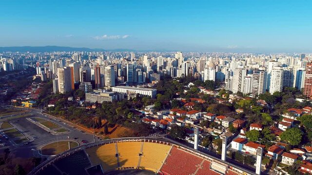 Aerial landscape of sports scenery at Sao Paulo city Brazil. Cityscape near soccer stadium field. Pacaembu square avenue and sports stadium arena.