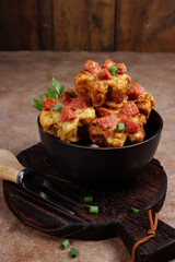 Tahu fantasi sosis or sarang burung is fried steamed tofu and top with sausages.
