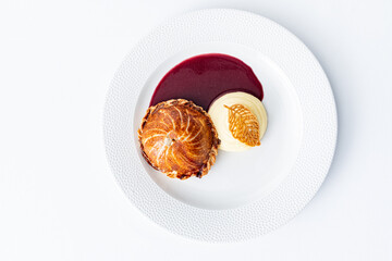  Raw beef steak on puff pastry background.