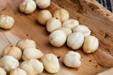 dried hazelnutsnuts on a wooden table