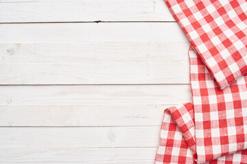 Red checkered tablecloth wooden background texture kitchen decoration