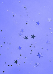 Festive background with glitters stars in trendy violet color.