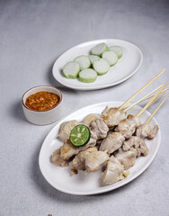 Sate taichan or taichan satay is a variation of chicken satay which burned without peanut or ketchup seasoning unlike other satays, usually served with hot sambal.
