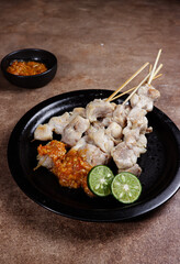 Sate taichan or taichan satay is a variation of chicken satay which burned without peanut or ketchup seasoning unlike other satays, usually served with hot sambal.
