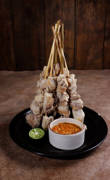 Sate taichan or taichan satay is a variation of chicken satay which burned without peanut or ketchup seasoning unlike other satays, usually served with hot sambal.
