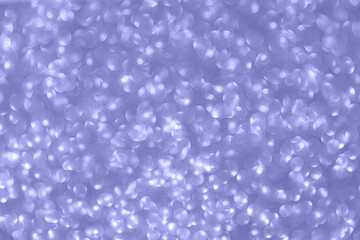 Glitter sparkling purple texture. Beautiful Christmas and new year bokeh blurred background. Trendy color