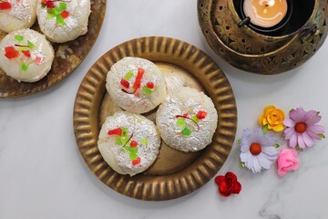Rasmalai or Malai Sandwich, Roshmolai, Rasamalei is very popular Indian dessert. A sweet malai stuffing inside Rasgulla. It's a sweet delicacy made with Indian cottage cheese or chenna. Copy space.