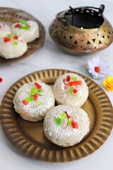 Rasmalai or Malai Sandwich, Roshmolai, Rasamalei is very popular Indian dessert. A sweet malai stuffing inside Rasgulla. It's a sweet delicacy made with Indian cottage cheese or chenna. Copy space.