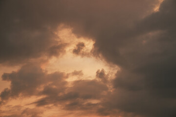 Fototapeta na wymiar Heaven sky during sunset. Summer sky full of orange sunlight