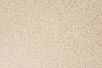 Uneven wall surface with decorative beige plaster - obrazy, fototapety, plakaty