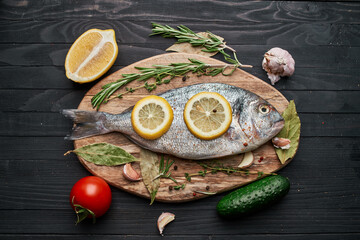 fish on wooden board ingredients lemon fresh food sea food