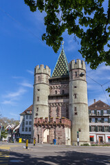 Fototapeta na wymiar Basel Switzerland - April 26. 2021: The ancient city gate Spalentor. It is one of the most beautiful city gates in Switzerland