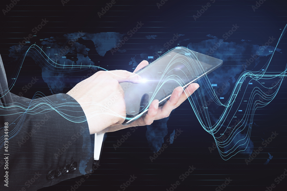 Poster businessman hand using tablet with creative glowing business chart and map hologram on blurry backgr