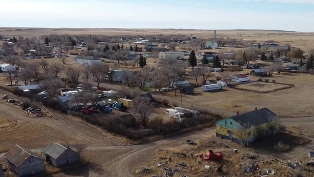 Drone view over head of the town of Empress Alberta Canada during the daytime in the prairies.