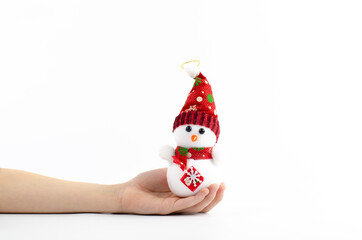 Snowman in the snow. Snowman with a hat. On white background. Merry christmas and a happy new year. Santa. Christmas decorations winter.