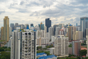 Fototapeta premium Aerial view of Bangkok Downtown Skyline, Thailand. Financial district and business centers in smart urban city in Asia. Skyscraper and high-rise buildings at sunset.