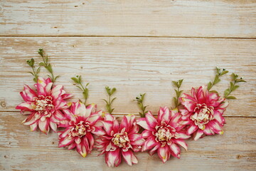 Obraz na płótnie Canvas Pink Flower bouquet with space copy on wooden background