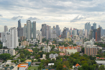 Fototapeta na wymiar Aerial view of Bangkok Downtown Skyline, Thailand. Financial district and business centers in smart urban city in Asia. Skyscraper and high-rise buildings at sunset.