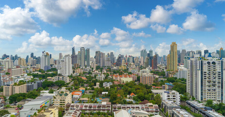 Naklejka premium Aerial view of Bangkok Downtown Skyline, Thailand. Financial district and business centers in smart urban city in Asia. Skyscraper and high-rise buildings at sunset.
