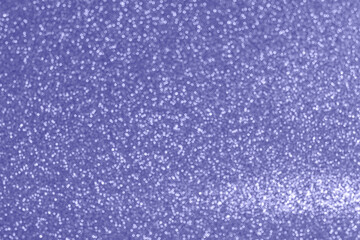 Veri Peri. Color of the year 2022. Abstract background toned trendy color 2022. Sparkle lights and bokeh. Useful as New Year background or greeting card. Festive Blurred Backdrop.