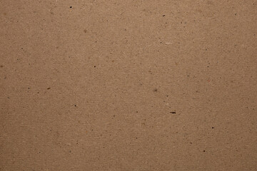Brown craft cardboard. Cardboard texture, abstract background.