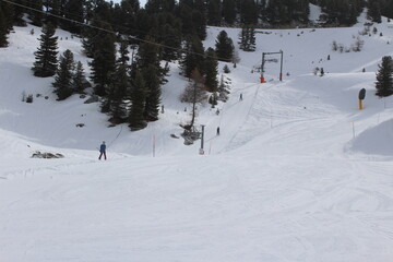 skiing in the mountains