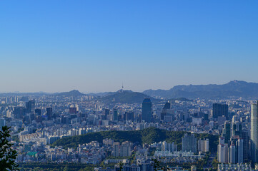 Seoul city view from the top of the mountain at day time