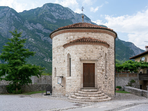 Stone rotunda with rocky mountain - San Michele chapel housing mummies of Venzone