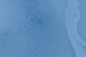 Texture of the ice surface. Winter background