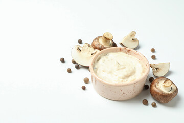 Concept of tasty food with mushroom sauce on white background