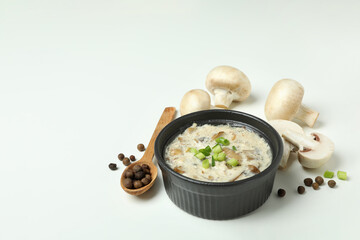 Concept of tasty food with mushroom sauce on white background